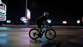 Neon-highway cyclist PE